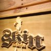 Skin Industries Standing Woman Wood Sign